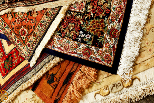 تأثیر کیفیت: چگونگی تأثیر کیفیت بافت و نخ بر قیمت فرش دستباف 12 متری